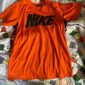 Boy’s Nike Dri Fit outfit. Orange/black. Youth medium. Shirt has small blemish.